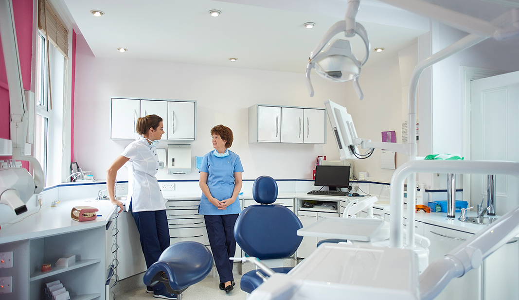 Dentist room and staff talking